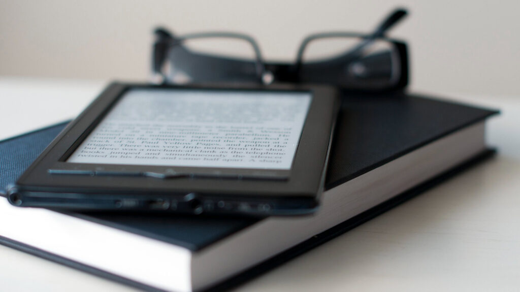 eBook ghostwriting in progress with notes and digital tools